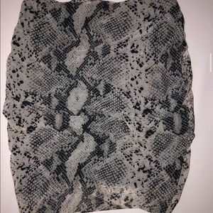 Snake print mesh skirt with underlining